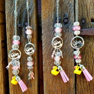 Breast Cancer Awareness Jeep rearview mirror charms.